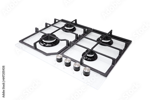 Modern gas stove on counter top white closeup. Hob gas stove made of tempered white glass using natural gas or propane for cooking products, isolated on white background.