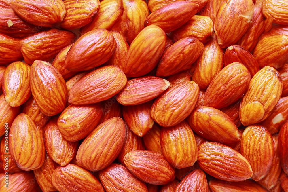 Fototapeta premium Close up of almonds, Background of big raw peeled almonds, Peeled almonds closeup background