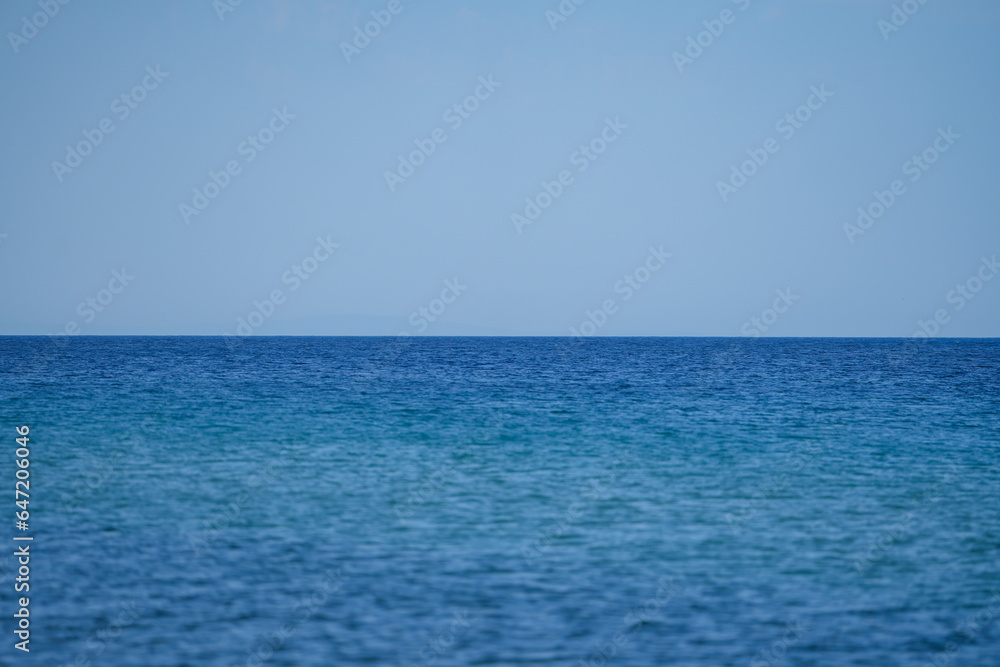 the horizon line. the horizon line marked by the sea. landscape. the horizon line. the horizon line marked by the sea. landscape.