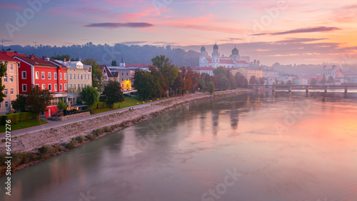Obraz na płótnie Passau Skyline, Germany. Cityscape image of Passau skyline, Bavaria, Germany at foggy autumn sunrise. w salonie