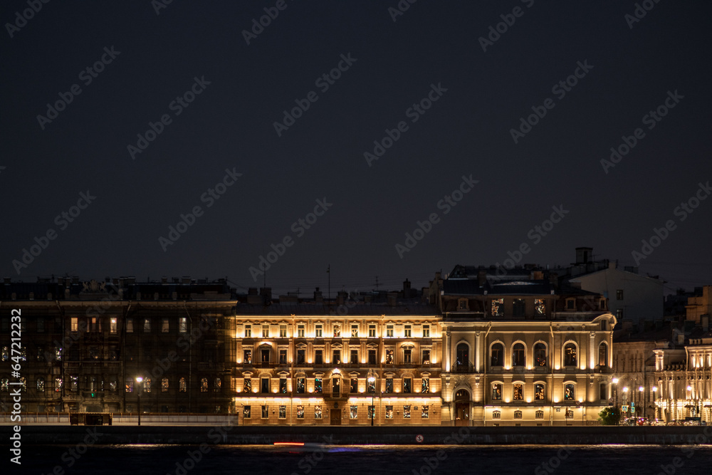 Embankment of a beautiful city at night. Beautiful illumination of buildings. Embankment of a beautiful city at night. Beautiful illumination of buildings.