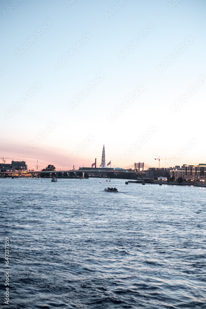 The embankment of a beautiful wide river in a large ancient city. The embankment of a beautiful wide river in a large ancient city.