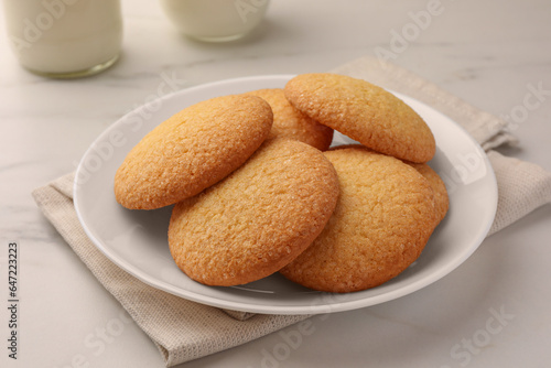 Delicious Danish butter cookies on white marble table, closeup