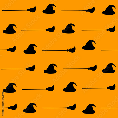 Halloween orange background with broomstick and hat