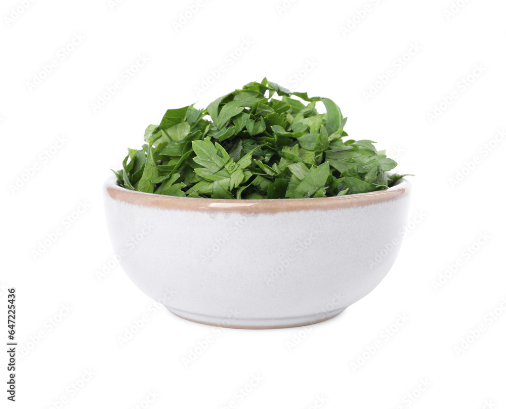 Chopped parsley leaves in bowl isolated on white Chopped parsley leaves in bowl isolated on white