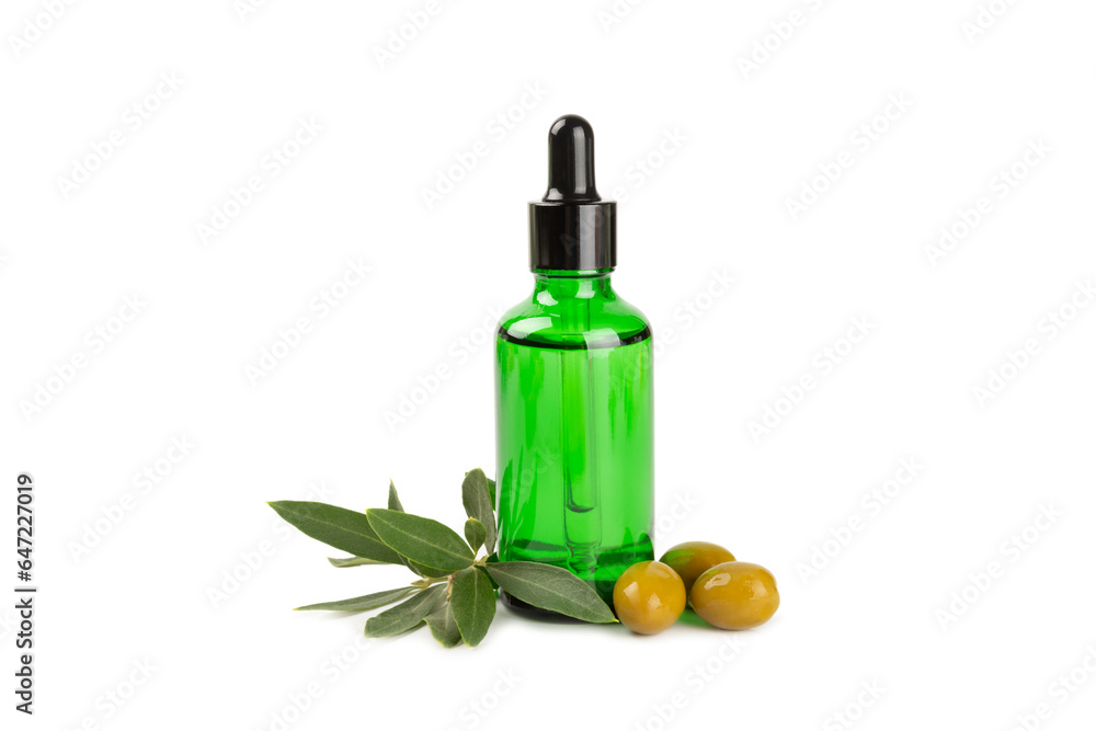 Olive essential oil. Glass bottle with olive oil isolated on a white background. Cosmetic oil. Olive essential oil. Glass bottle with olive oil isolated on a white background. Cosmetic oil.