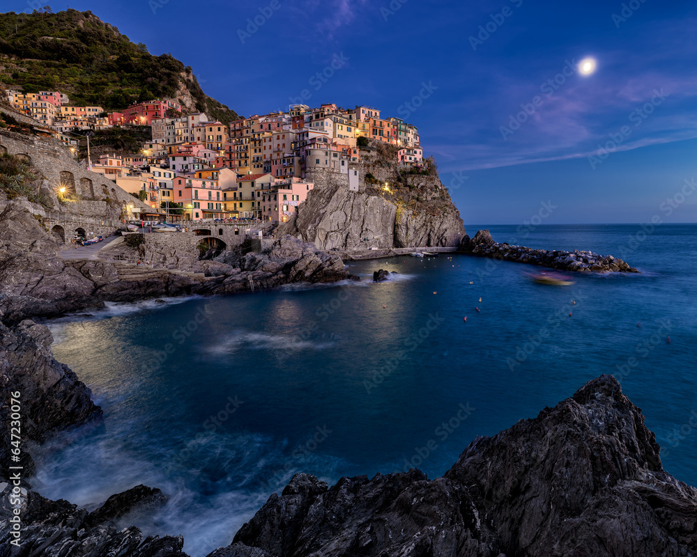 Panorama of the Unesco Heritage Manarola at the blue hour