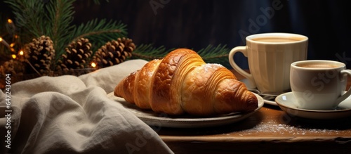Comfortable Christmas morning at home with a hot drink and pastry