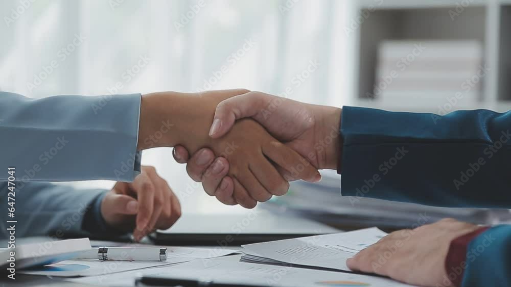 Business handshake for teamwork of business merger and acquisition,successful negotiate,hand shake,two businessman shake hand with partner to celebration partnership and business deal concept Business handshake for teamwork of business merger and acquisition,successful negotiate,hand shake,two businessman shake hand with partner to celebration partnership and business deal concept
