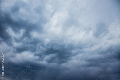 Wallpaper Mural dark stormy sky, dark clouds, dark sky with converging heavy clouds and violent storm before rain, sky and environment of bad or gloomy weather, carbon dioxide emissions, greenhouse effect, global war Torontodigital.ca