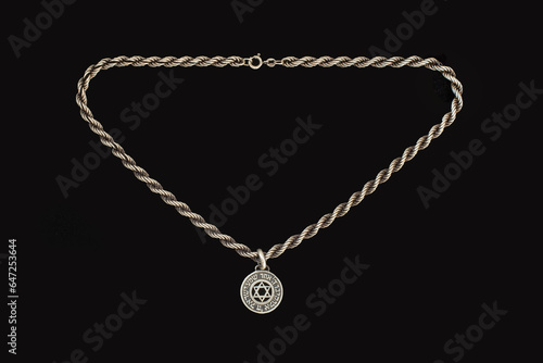 Wallpaper Mural Silver medallion with the Star of David (Magen David) and a prayer in hebrew "Hear, oh Israel, the Lord is our God, the Lord is one" on a massive twisted silver chain. Torontodigital.ca