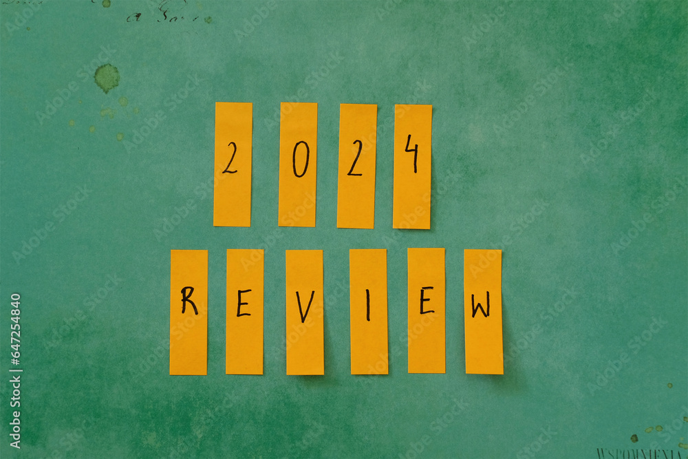 2024 review. Paper tags with 2024 review written. Concept photo of