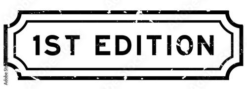 Grunge black 1st (First) edition word rubber seal stamp on white background