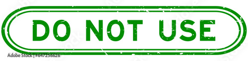 Grunge green do not use word rubber seal stamp on white background