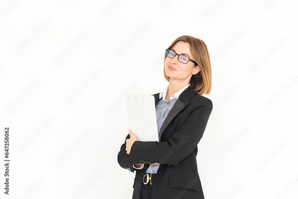 Young attractive and smiling business woman in black suit holding gadget isolated on white. Copy space and place for text concept Young attractive and smiling business woman in black suit holding gadget isolated on white. Copy space and place for text concept