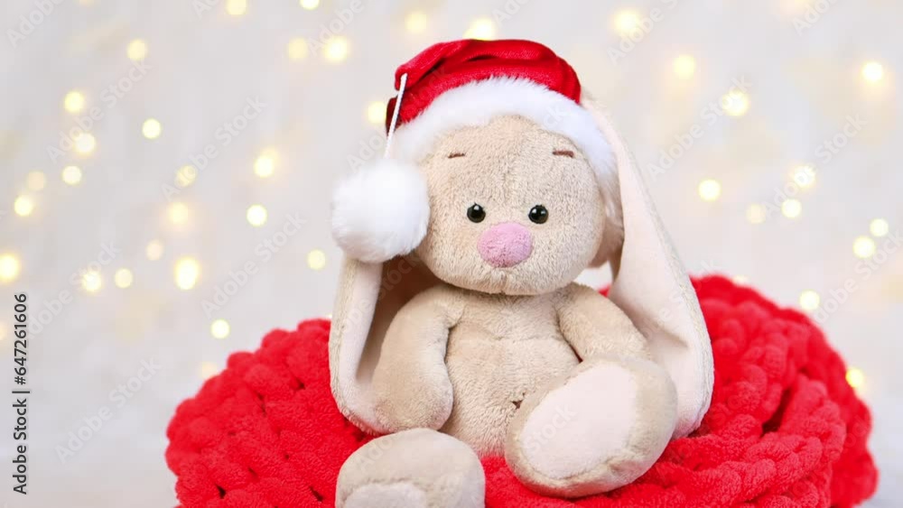Rabbit toy in Santa's hat. Rabbit toy in Santa's hat.