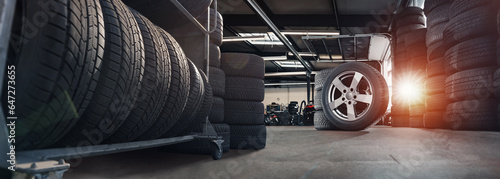 Obraz na płótnie tire at repairing service garage background