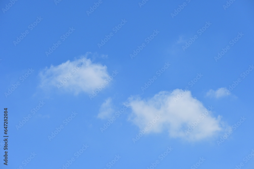 beautiful blue sky and white fluffy group of clouds with sunrise in the morning, natural background beautiful blue sky and white fluffy group of clouds with sunrise in the morning, natural background