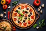 Cheese pizza with vegetables, bell peppers, olives, mushrooms and oregano from top view. High quality photo. 