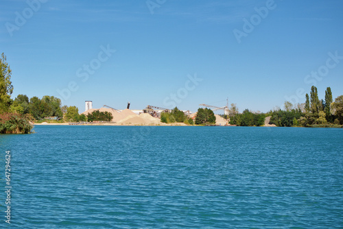 Gravel quarry at excavation lake called 'Betonsee' in Waghäusel-Wiesental, Germany © Firn