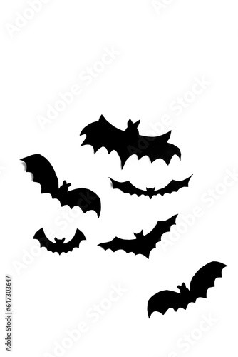 Bats made of black paper on a white background. Halloween crafts - black bats. DIY bats for Halloween.