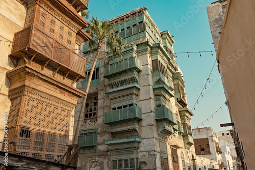 Traditional architecture of old Jeddah town El Balad district houses with wooden windows and balconies Unesco Heritage site in Jeddah Saudi Arabia