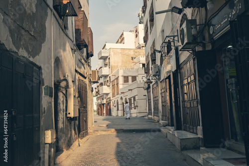 Old souk market street with traditional arabic goods in historical town of Jeddah Al Balad Saudi Arabia photo