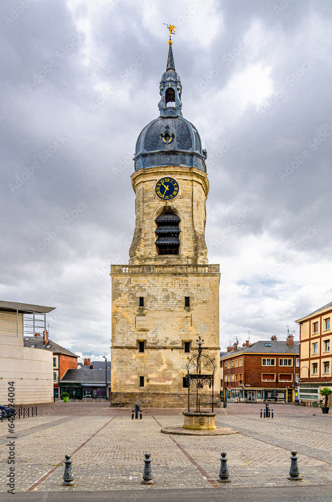 Belfry of Amiens beffroi d'Amiens bell tower stone building with clock and spire and stone well on empty square in old historical city centre, Somme department, Hauts-de-France Region, France
