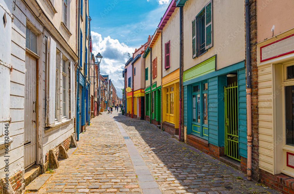 Obraz premium Cityscape of Amiens historical city centre Saint-Leu quarter. Colorful houses and multicolored buildings on narrow street of old town in France, France landmarks, Hauts-de-France Region, France