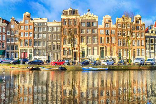 Photography Cityscape on a sunny winter day - view of the houses and the city channel with b
