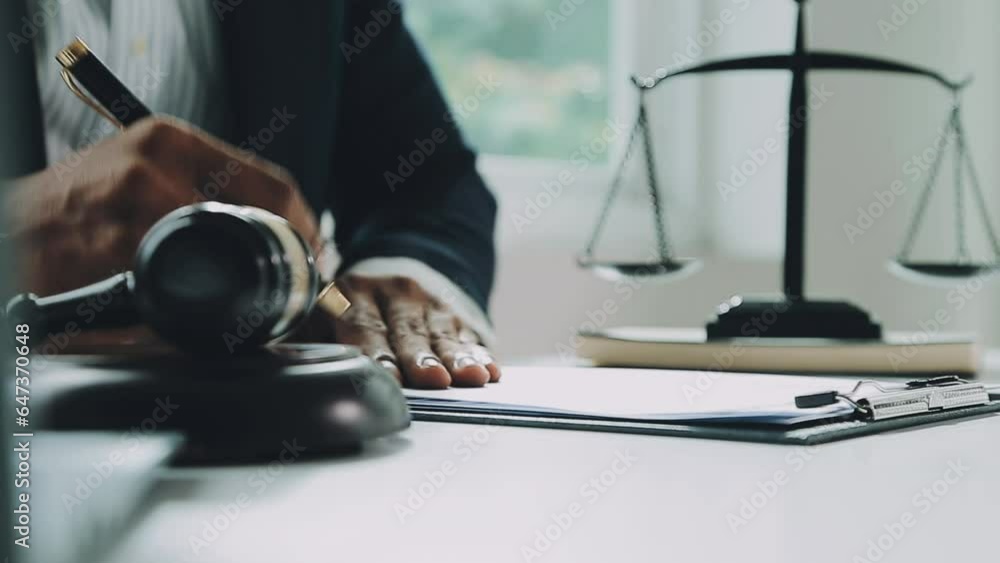 Judge gavel with Justice lawyers having team meeting at law firm background. Concepts of Law and Legal services. Judge gavel with Justice lawyers having team meeting at law firm background. Concepts of Law and Legal services.