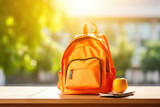 Bright Orange School Backpack on Table