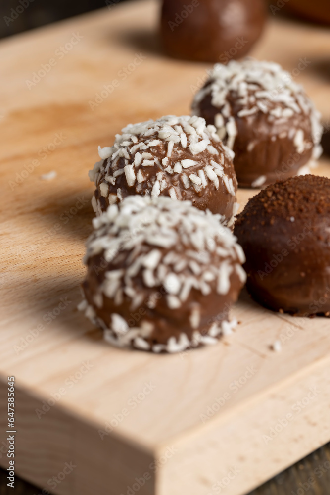 Chocolate candies with coconut flavor and filling Chocolate candies with coconut flavor and filling