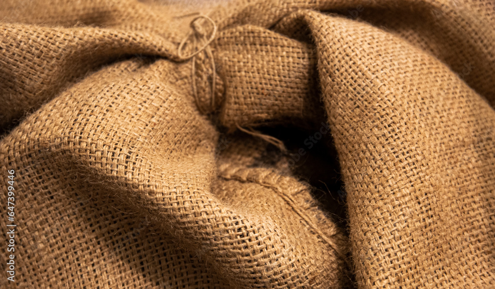 Jute bag. Close-up image of an old natural fiber sack. Jute bag. Close-up image of an old natural fiber sack.