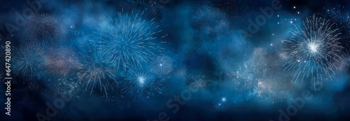Fireworks in the night sky, New Year's Eve holiday background
