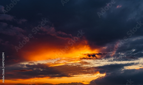 Fiery evening sunset, orange-blue color. © Edgar Martirosyan