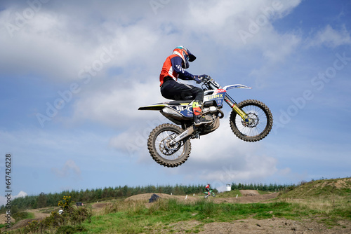 Fototapeta Naklejka Na Ścianę i Meble -  motocross rider jumping