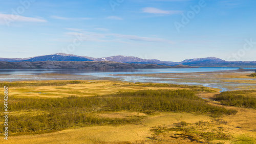 Typical norwegian landscape with fjords and wetland near Lakselv in Norway