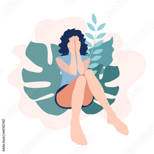 Depressed woman cover face with hands. Concept of mental disorder, sorrow and depression, social phobia.woman hides face in hands. Female sitting on floor in despair hiding face with hands. EPS10
