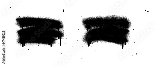 Black color spray paint or graffiti design element on the white wall background.	 photo
