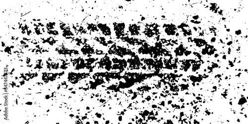 Black and white grunge tyre track background. Dust overlay distress shape. Dirty splattered shape. Vector illustration. Distressed design element for create vintage grunge effect with noise and grain