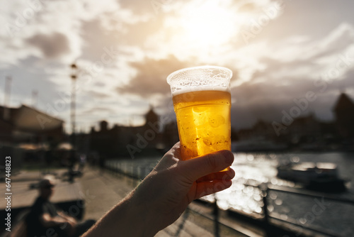 Fresh beer on the streets of a European city. photo