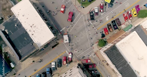 Birds eye drone shot of classic cars lining streets of Cynthiana Kentucky