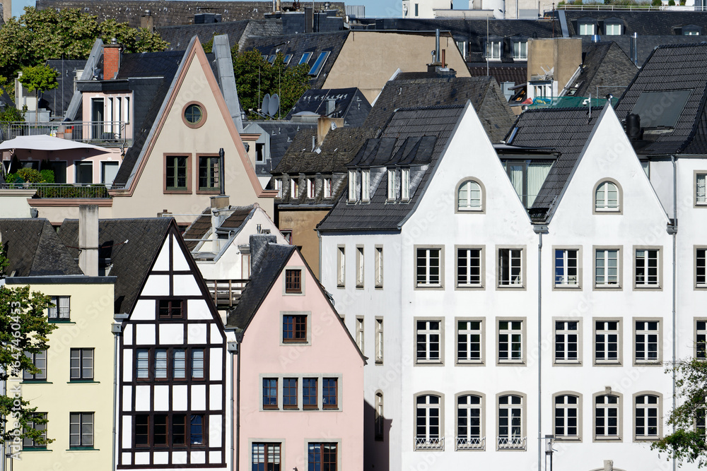 typical narrow gabled houses on the banks of the rhine in the old town of cologne