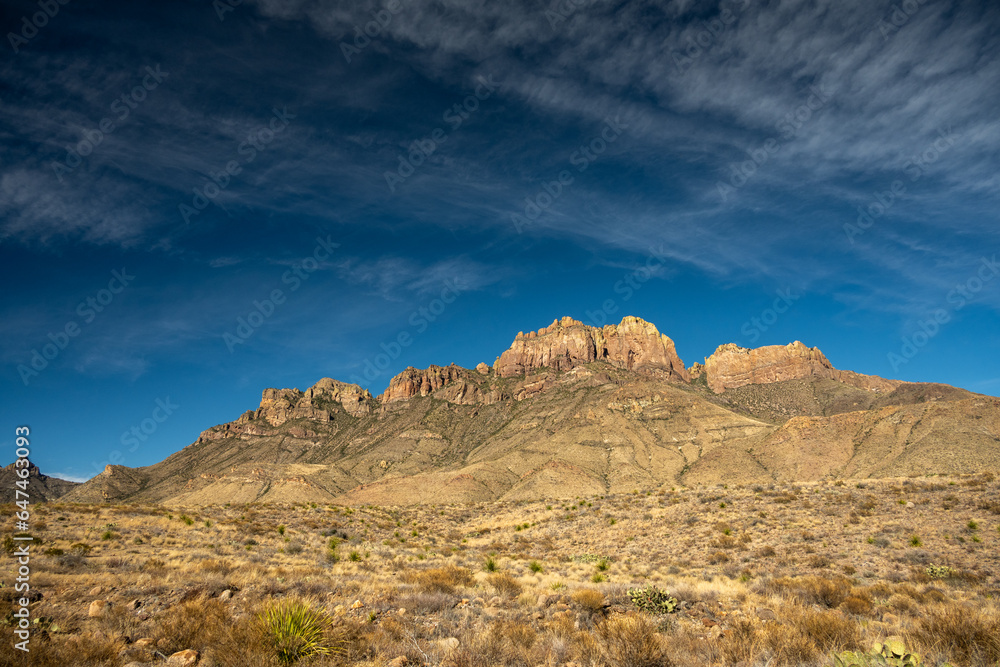 Crown Mountain Under Deep Blue Sky and Wispy Clouds