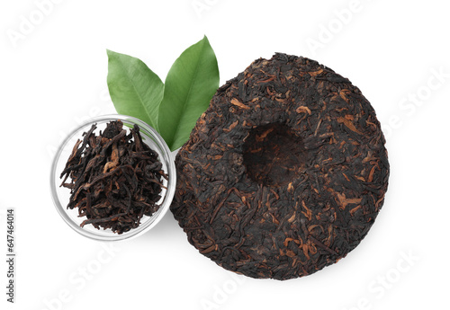 Traditional Chinese pu-erh tea and fresh leaves isolated on white, top view