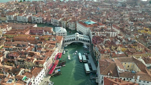 Venice, Aerial view of Rialto bridge crossing the Grand Canal in Venice downtown, Veneto, Italy