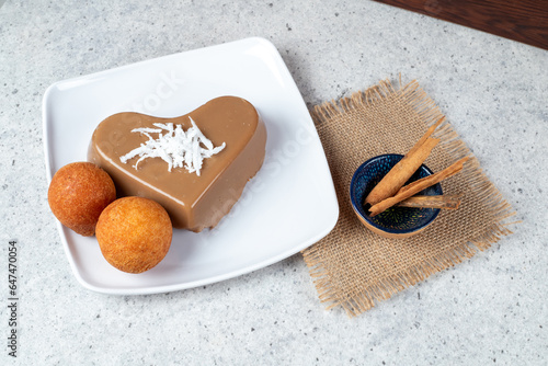 Deliciosos buñuelos y natilla colombianos photo