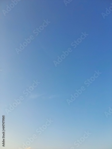 Photo of clouds and sky, shadows of clouds the blue sky. Suitable for backgrounds.