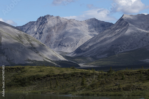 Late Afternoon Light Shining On The Mountains Along The Wind River In The Peel Watershed; Yukon, Canada photo